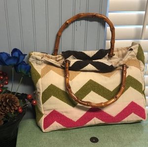 woman handbag with small wooden handles made of fabric